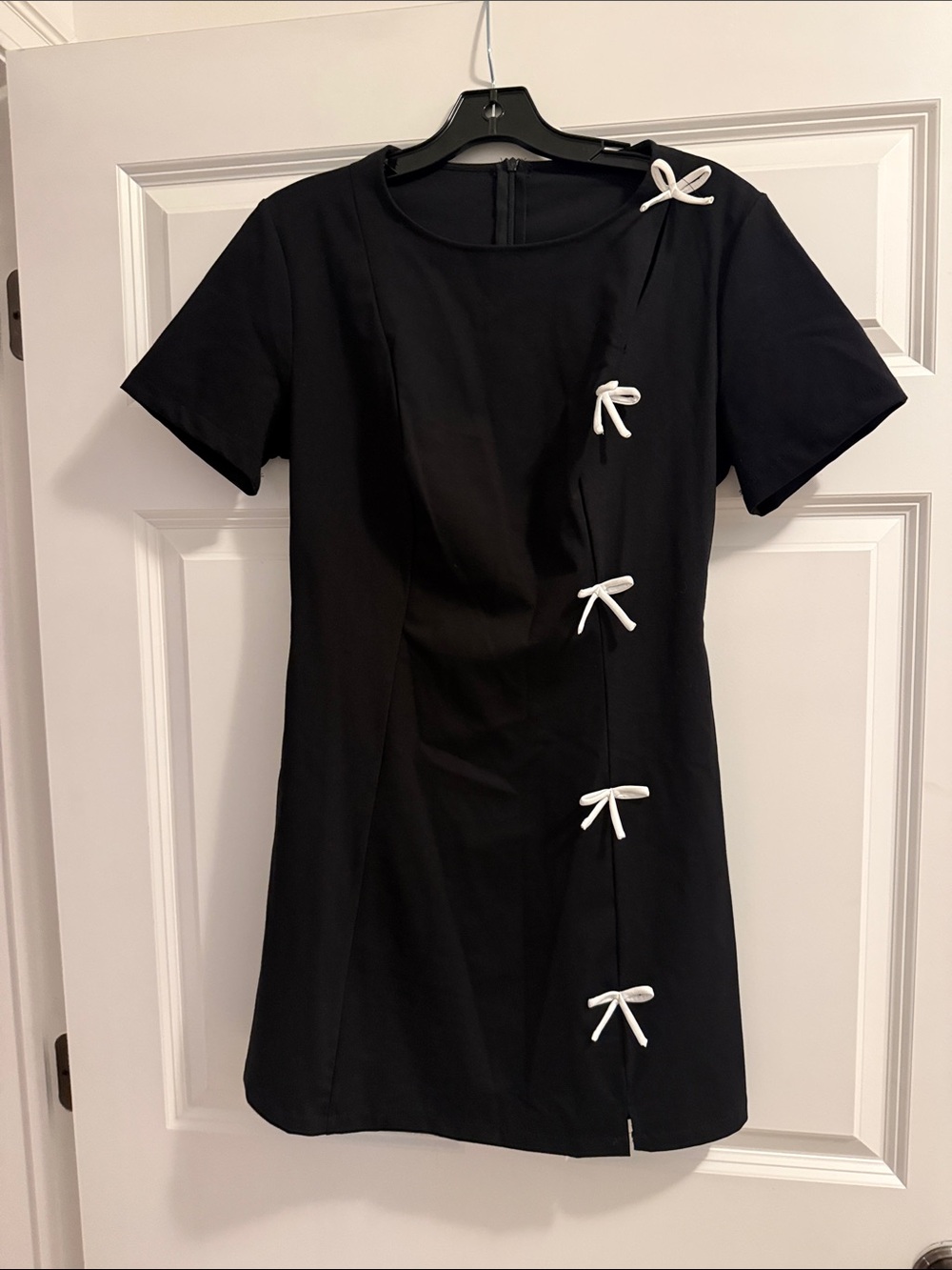 Black Short-Sleeve Dress with White Bow Accents